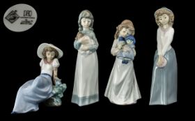 Nao by Lladro Collection of 4 Hand Painted Porcelain Figurines.