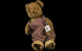 Early 20th Century Mohair Straw Filled Bear, overall poor condition, as found. 16" long.