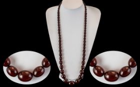 Early 20th Century Superb Cherry Amber Long Graduated Beaded Necklace. c.1920's.