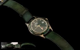 Swiss Military Watch, green dial, baton numerals, with date. Green leather strap. Quartz movement.