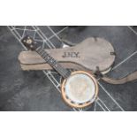 Keech Ukulele Banjo, closed back, in canvas case, overall length 21.75".