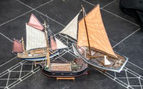 Collection of Three Model Boats, to include two fishing boats, and a yacht,