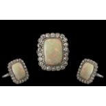 Antique Period - Platinum Set Superb Quality Diamond and Opal Set Dress Ring.