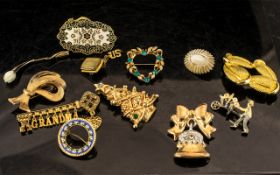 Vintage Gold Tone Collection of Brooches. Various Sizes and Subjects.