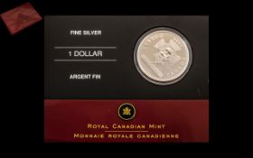 Royal Canadian Mint Boxed Uncirculated Silver Dollar.