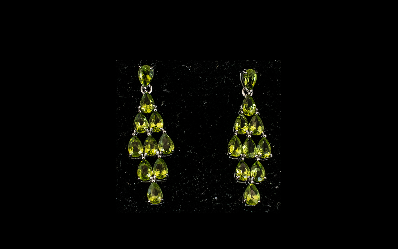 Peridot Five Row Kite Shaped Drop Earrings, of 9cts; each earring with the brilliant, sparkling