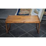 Teak Coffee Table of Plain Form, rectangular top, square shaped supports.