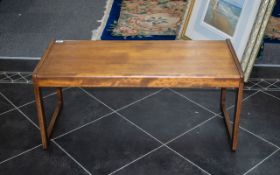 Teak Coffee Table of Plain Form, rectangular top, square shaped supports.