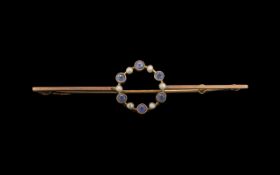 Antique 9ct Gold Bar Brooch. Decorated to Centre with Light Blue Sapphire and Seed Pearls.