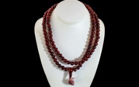 A Faux Cherry Amber Plastic Bead Necklace, Ottoman type prayer beads. Length 40", weight 72 grams.