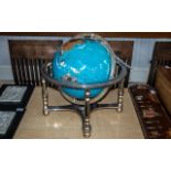 Lapis Gemstone Globe, set with gemstones, mounted on steel tripod stand, with four legs.