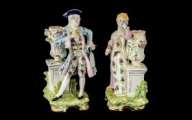 Pair of Porcelain Figures, depicting a lady and gentleman in traditional dress,