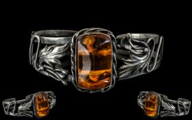 Art Nouveau Silver Bangle with Large Amber Stone Set to Middle.