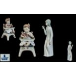 Lladro Figure no. 6299 'Little Bear' depicting a young girl sat in a high chair holding a teddy