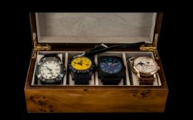 Collection of Five Fashion Watches, housed in a wooden case,