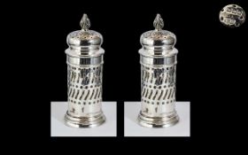 Edwardian Period Superior Quality Pair of Sterling Silver Pepperettes with Flame Finials to Top of