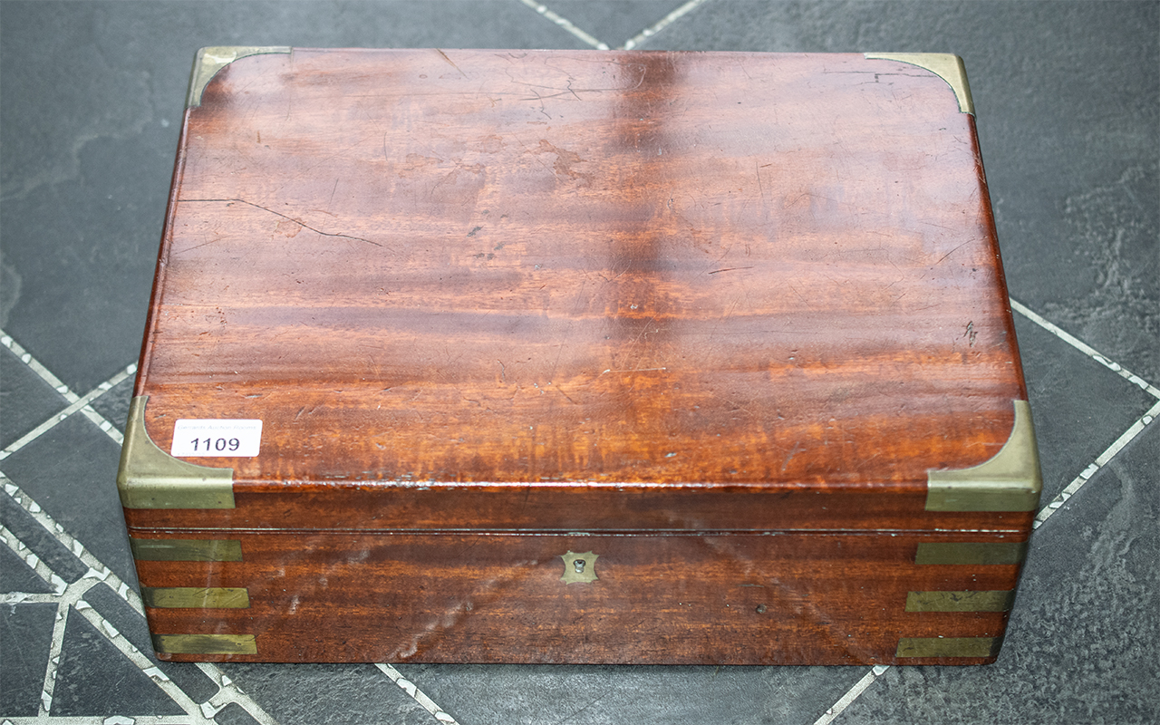 A Mahogany Victorian Sewing Box with lift out tray with various compartments.