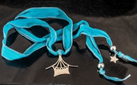 Balar Statement Silver Necklace, Suspended on a Vibrant Sky Blue Ribbon, Lovely Contemporary Elegant