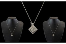 18ct Gold Diamond Set Pendant of square design set with princess cut diamonds.