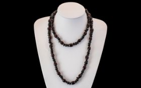 Antique Period Black Jet and Garnet Beaded Necklace of Long Length. Length 40 Inches - 100 cms.
