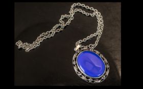 Large Lapis Stone Set Pendant In Silver With Attached Silver Necklace.