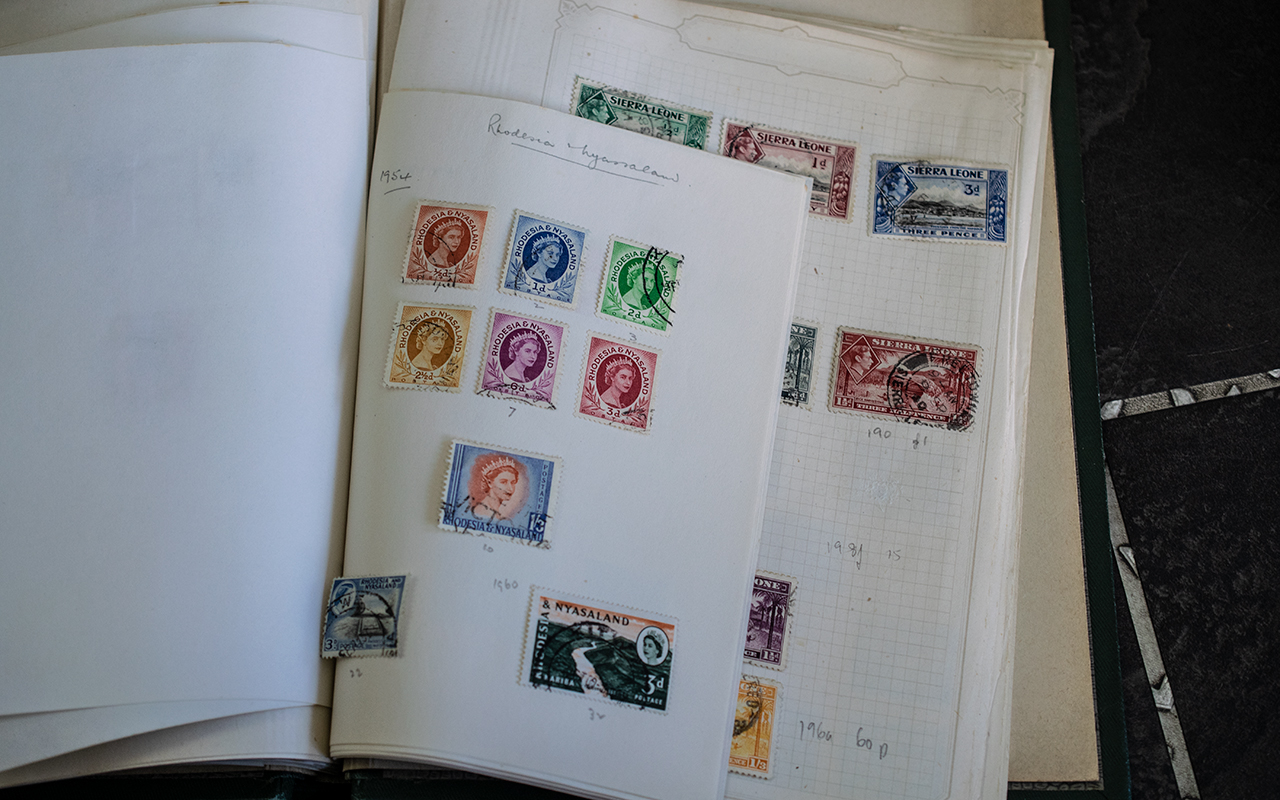 Small Green Springback Album with many useful early British Commonwealth postage stamps. - Image 2 of 3