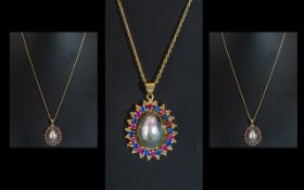 14ct Yellow Gold - Attractive Sapphires and Rubies Set Ornate Oval Shaped Pendant Drop with gold