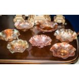 Collection of Carnival Glass, comprising eight assorted fluted bowls, approx 9" diameter,