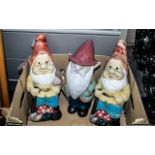 Two Vintage Terracotta Gnomes plus one other.