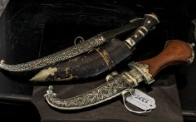 Two Islamic Knives and A Kukri Knife, made for the tourist market, display purposes.