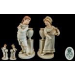 Royal Worcester Fine Pair of 19th Century Porcelain Figural Posy Vases.