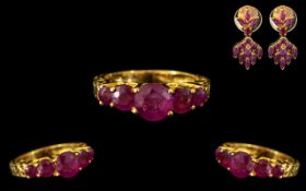 An Indian 22ct Gold Ruby Set Ring and Earrings.