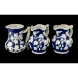 Three Blue & White Victorian Harvest Jugs, two with impressed marks to base IV K 21 No.