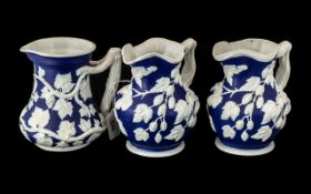 Three Blue & White Victorian Harvest Jugs, two with impressed marks to base IV K 21 No.