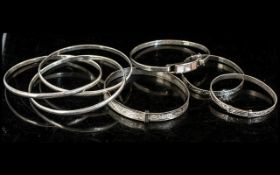 Large Collection of Silver Bangles.