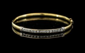 `8ct Gold Hinged Bangle, Channel Set CZ Stones, Stamped 750,