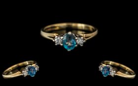 Ladies Attractive 9ct Gold 3 Stone Aquamarine and Diamond Set Ring.