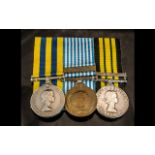 A Group of Three Medals to include, the Africa general service medal with Kenya clasp,