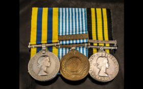 A Group of Three Medals to include, the Africa general service medal with Kenya clasp,
