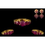 An Indian 22ct Gold Ruby Set Ring and Ea