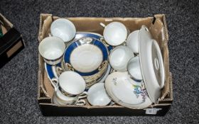 Two Porcelain Tea Sets, comprising Staff