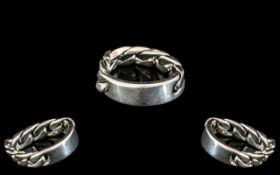 Unusual Designer Silver Ring In the Form