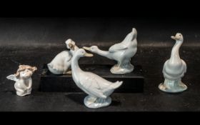 Collection of Nao by Lladro Birds, comprising three geese, one looking back,