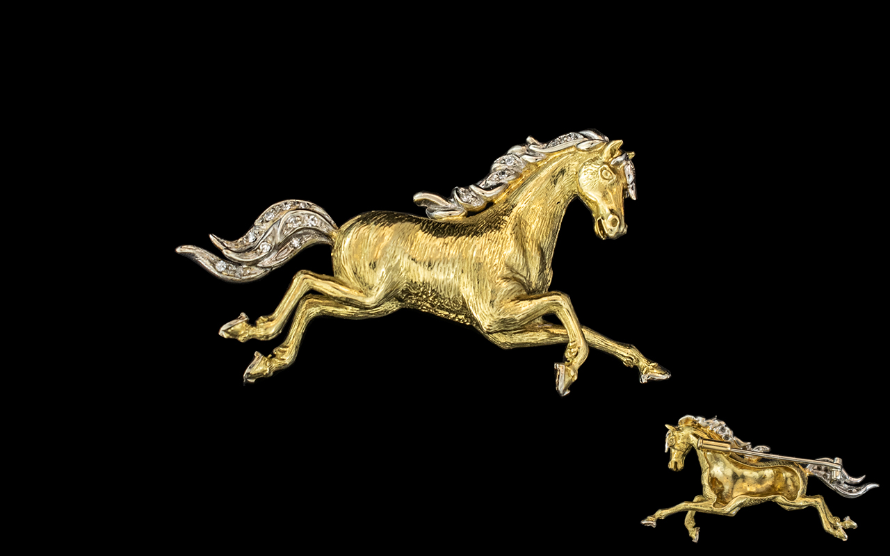An 18ct Gold Diamond Set Brooch modelled in the form of a galloping horse mane and tail with