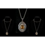 Large Silver Pendant - Suspended on a Silver Necklace. Locket of Top Quality with Large Amber