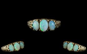 Ladies 9ct Gold Attractive 3 Stone Opal Set Ring - Gallery Setting. Marked 375 to Interior of Shank.