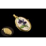 18ct Gold Locket / Pendant In Oval Form. Marked 750. With Enamel Front, Approx 9 grams.