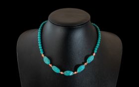 A Turquoise and Coral Bead Necklace length 16 inches
