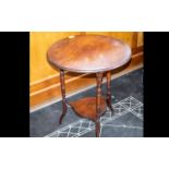 A Small Mahogany Occasional Table circular top, turned supports. 22 inches diameter, height 26