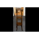 Mahogany Inlaid Three Tier Plant Stand, raised on four tapering legs,